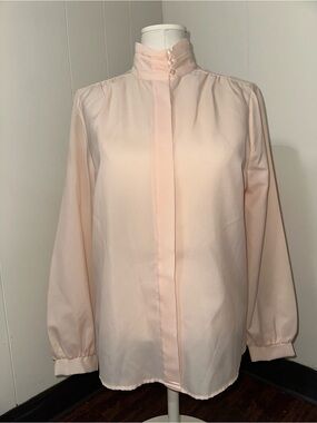 Vintage 1980s pastel peach-pink blouse from the brand Jessica Michelle.